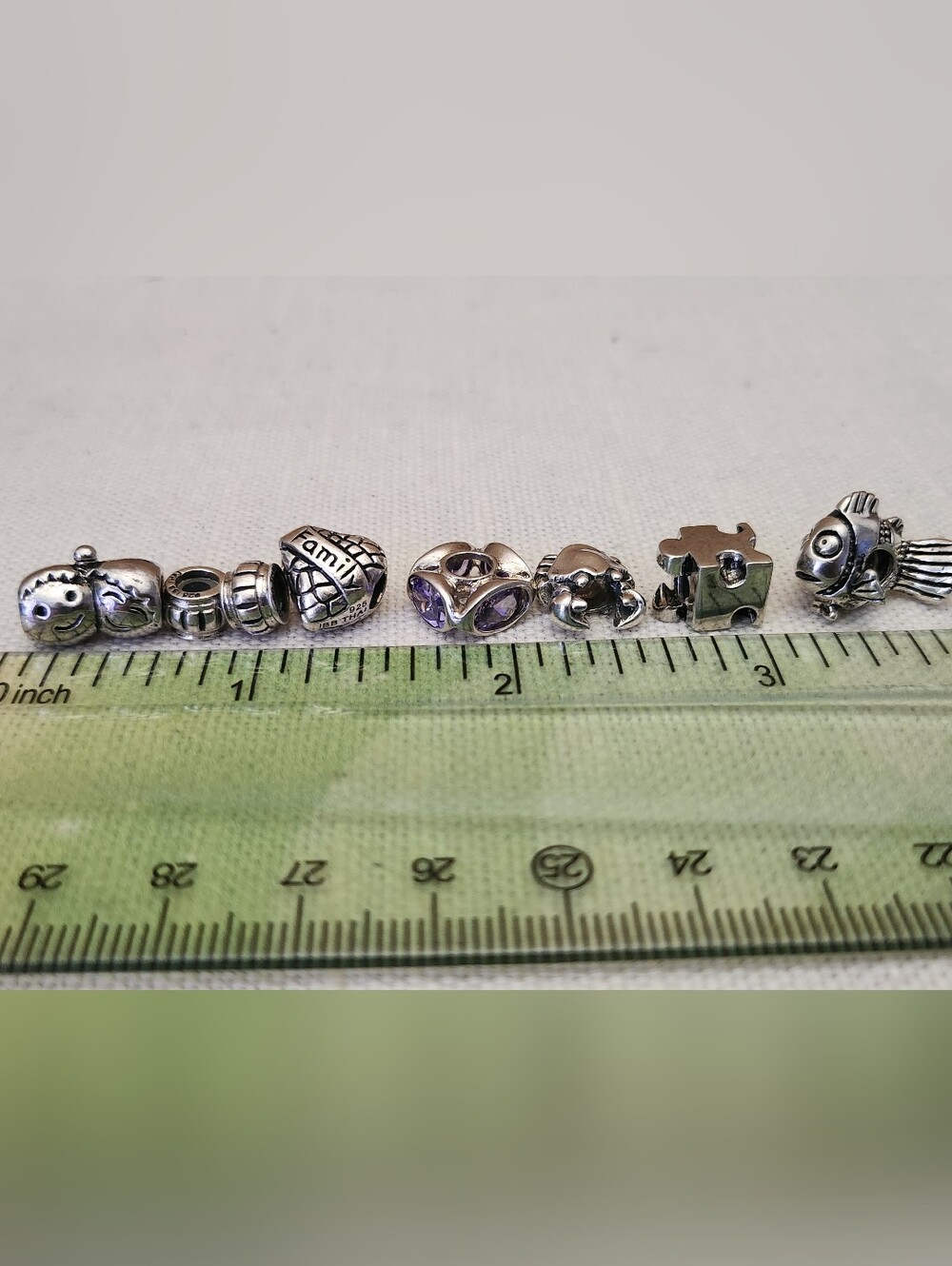 7 Unbranded And IBB Sterling Silver Slide Bead Charms